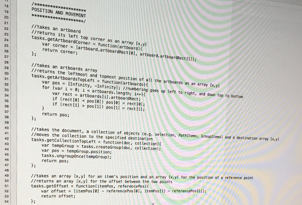 Photo of a computer screen with code for resizing icons in Illustrator